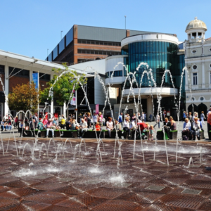 The Playhouse Theatre in Williamson Square with fountains in the foreground.