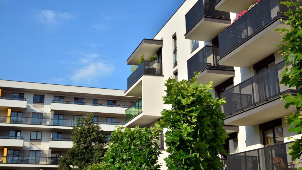 Brand new apartment building on sunny day
