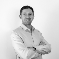Bradley Ashley office headshot in black and white